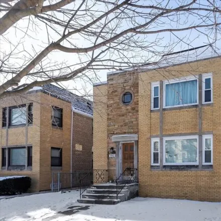 Buy this 4 bed house on 5940 North Virginia Avenue in Chicago, IL 60659
