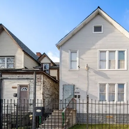 Buy this 6 bed house on 8028 South Normal Avenue in Chicago, IL 60620