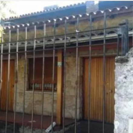 Buy this 4 bed house on Arrecifes 1247 in Partido de Morón, B1712 CDU Castelar