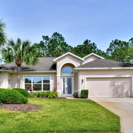 Buy this 3 bed house on 1237 Sunningdale Lane in Ormond Beach, FL 32174