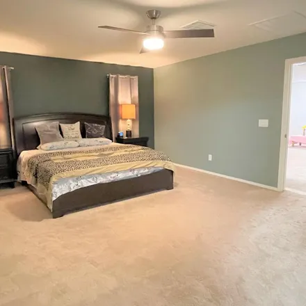 Rent this 5 bed apartment on 2315 East Runaway Bay Place in Gilbert, AZ 85298