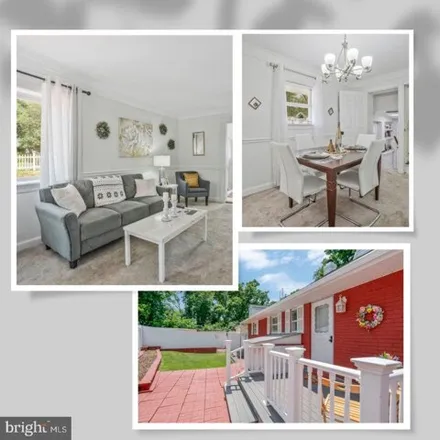 Buy this 4 bed house on 4928 14th St S in Arlington, Virginia