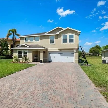 Buy this 5 bed house on 10408 Canal Brook Lane in Lehigh Acres, FL 33936