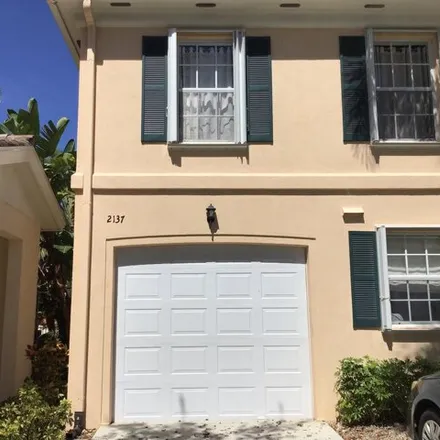 Rent this 3 bed house on 2147 Tigris Drive in West Palm Beach, FL 33411
