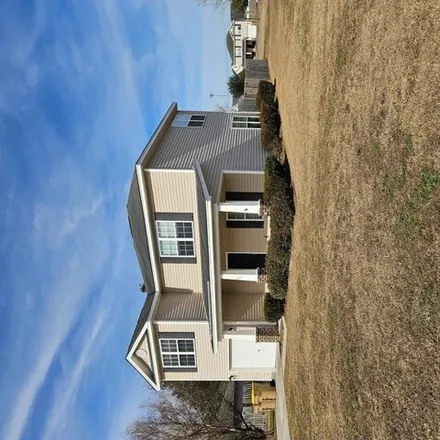 Rent this 3 bed house on Chestnut Oak Drive in Richmond Hill, GA 31324