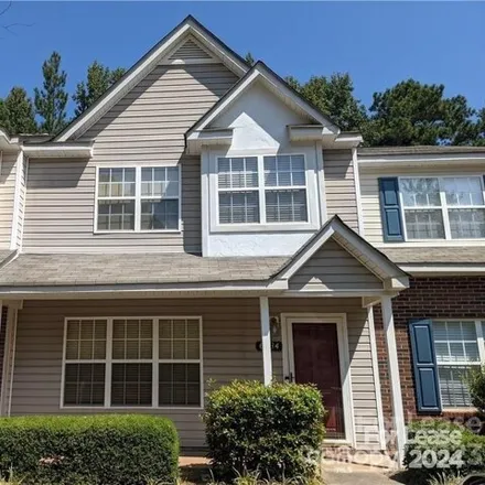 Rent this 3 bed townhouse on 6738 Cypress Tree Lane in Charlotte, NC 28215
