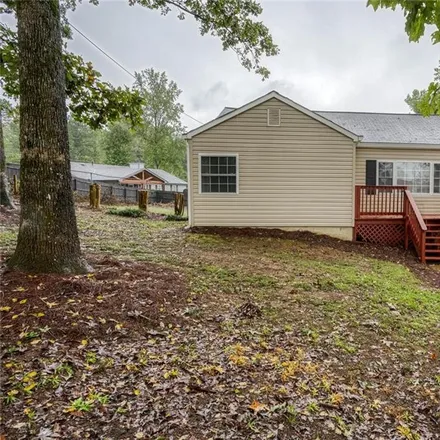 Rent this 2 bed house on 113 Hideaway Village Road in Cherokee County, GA 30188