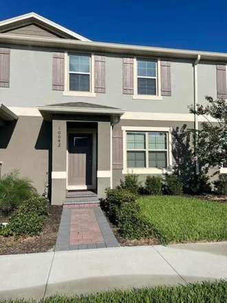Rent this 3 bed townhouse on Crew Alley in Village H, FL
