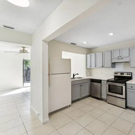 Buy this 2 bed townhouse on 5105 Breckenridge Place in Palm Beach County, FL 33417