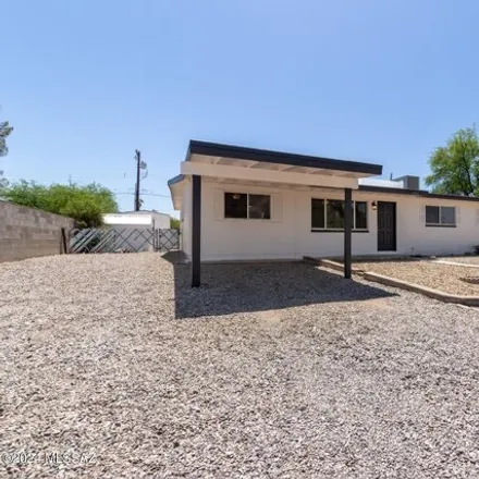 Buy this 4 bed house on 5211 East Ferry Drive in Tucson, AZ 85711