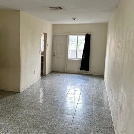 Buy this 2 bed townhouse on 234 Northwest 84th Street in Little River, Miami-Dade County