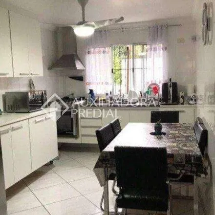 Buy this 3 bed house on Escola Municipal Fernando Pessoa in Rua Piramboia 460, Jardim Stella