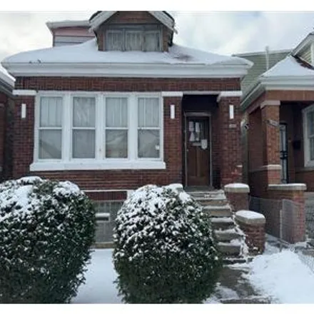 Buy this 4 bed house on 8828 South Wood Street in Chicago, IL 60620