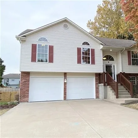 Buy this 4 bed house on 1229 Southeast Scenic Drive in Blue Springs, MO 64014