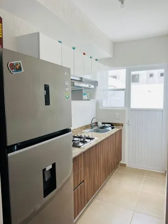 Rent this 4 bed house on Avenida Los Arboles in Gran Santa Fe II, 77518 Cancún