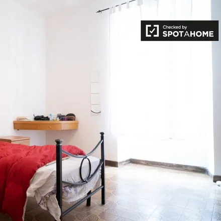 Rent this 3 bed room on Tabacchi Cruciani in Via Tiburtina, 54