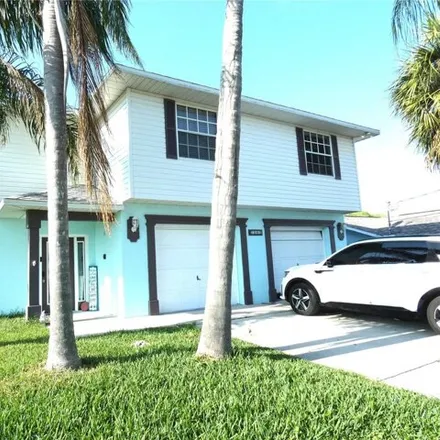 Buy this 4 bed house on 7477 Hatteras Drive in Hudson, FL 34667