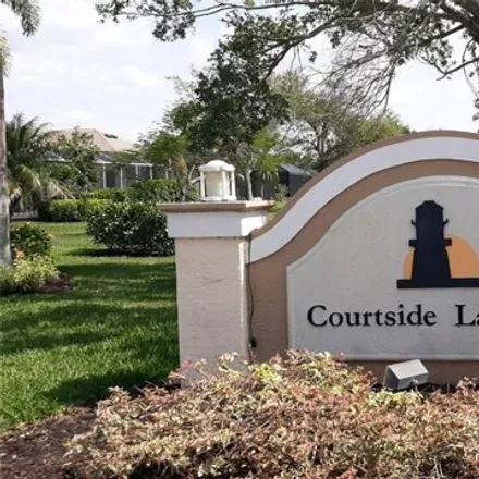 Buy this 2 bed house on 17921 Courtside Landings Circle in Burnt Store Marina, Lee County