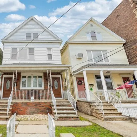 Buy this 6 bed house on Phillip G Vroom Number 2 Elementary School in West 26th Street, Bayonne