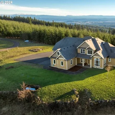 Buy this 4 bed house on Northeast Highland Meadows Drive in Proebstel, WA