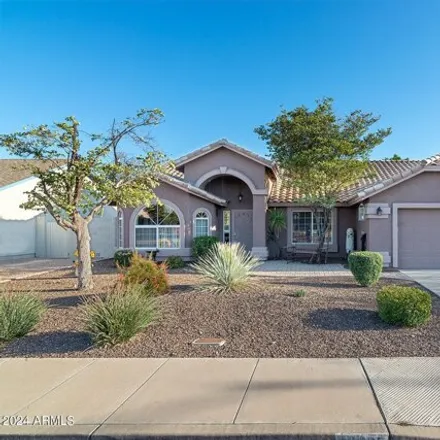 Buy this 4 bed house on 10927 East Cholla Street in Mesa, AZ 85207