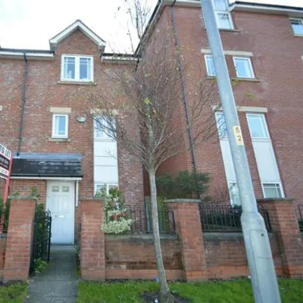 Rent this 4 bed townhouse on 147 Chorlton Road in Manchester, M15 4JG