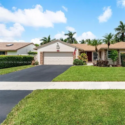 Buy this 4 bed house on 14501 Greenbriar Place in Davie, FL 33325