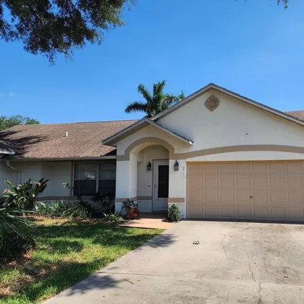 Rent this 3 bed house on Royal Poinciana Boulevard in Melbourne, FL 32935