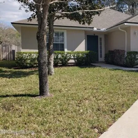 Rent this 3 bed house on 712 South Lilac Loop in Fruit Cove, FL 32259