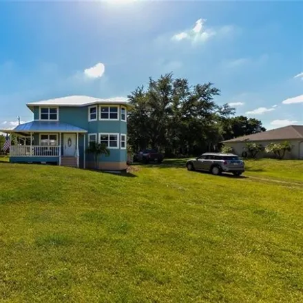 Buy this 3 bed house on 6078 Lacota Avenue in Lehigh Acres, FL 33905