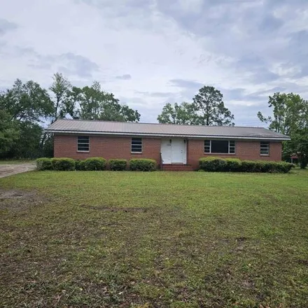 Buy this 4 bed house on 577 Plantation Road in Perry, FL 32348