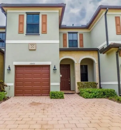 Rent this 3 bed townhouse on 10425 W 32nd Ln in Hialeah, FL 33018