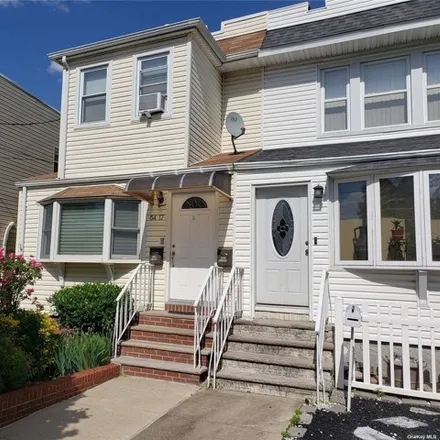 Buy this 2 bed house on 64-17 71st St in Middle Village, New York