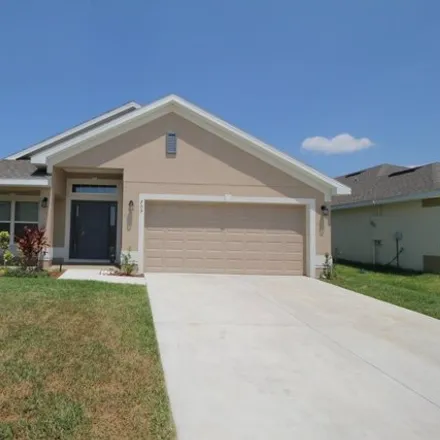 Rent this 3 bed house on Kylar Drive Northwest in Palm Bay, FL