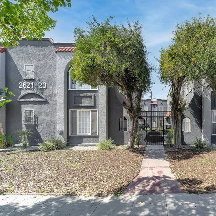 Buy this studio townhouse on 2409 South Victoria Avenue in Los Angeles, CA 90016