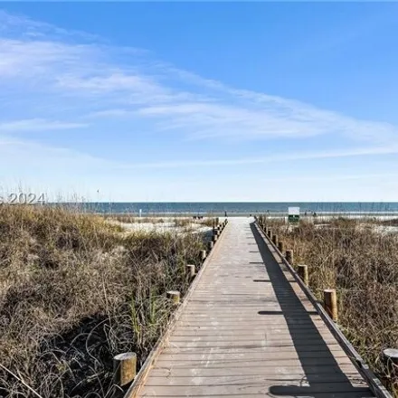 Buy this 2 bed condo on Ocean Oaks by Hilton in South Forest Beach Drive, Coligny