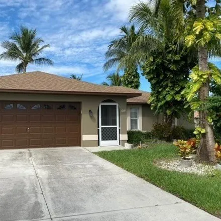 Rent this 3 bed house on 665 Southeast 31st Terrace in Cape Coral, FL 33904