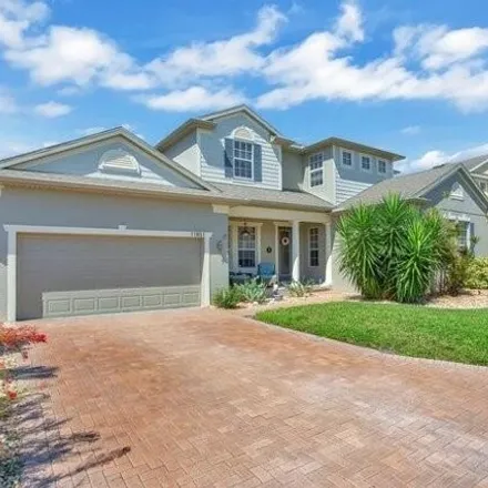 Buy this 5 bed house on 11851 Sheltering Pine Dr in Orlando, Florida