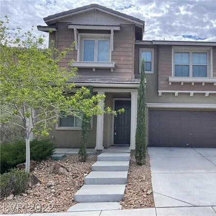 Rent this 4 bed house on 10495 Winter Grass Drive in Summerlin South, NV 89135