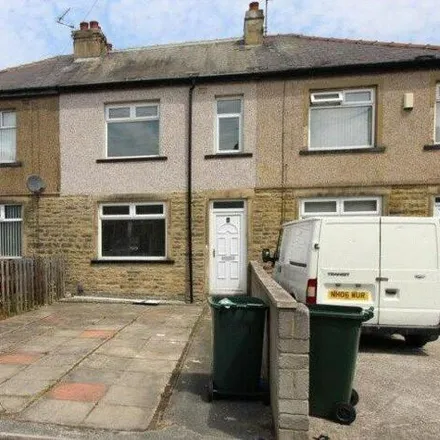 Rent this 3 bed townhouse on Draughton Grove in Bradford, BD5 9QH