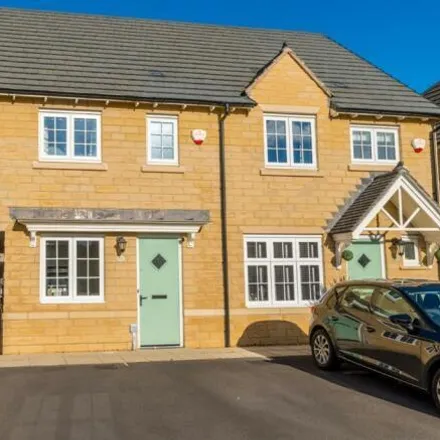 Rent this 3 bed townhouse on Bletchley Fold in Horsforth, LS18 4FY