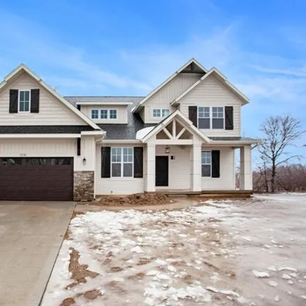 Buy this 5 bed house on 7778 Hidden Ridge Drive in Georgetown Charter Township, MI 49426