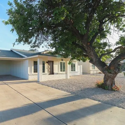 Buy this 3 bed house on 4159 East Sweetwater Avenue in Phoenix, AZ 85032