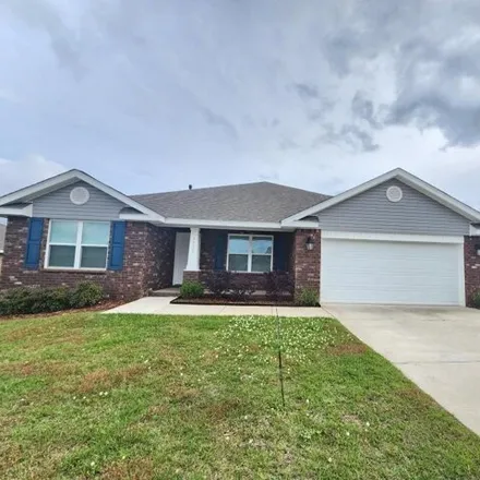 Buy this 4 bed house on 3573 Conley Dr in Cantonment, Florida
