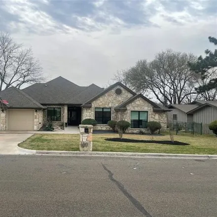 Rent this 3 bed house on 403 Olympia Fields Street in Meadowlakes, Burnet County