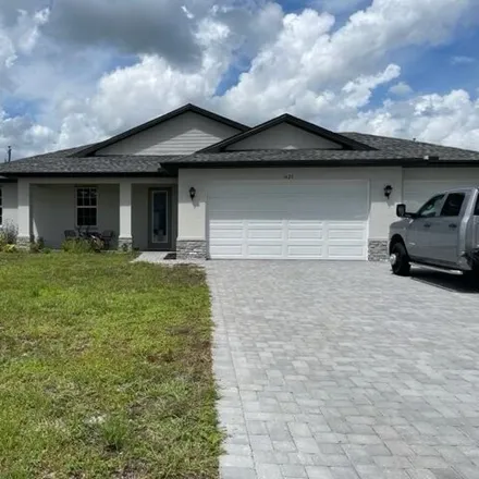 Rent this 3 bed house on 1489 Southwest 13th Terrace in Cape Coral, FL 33991