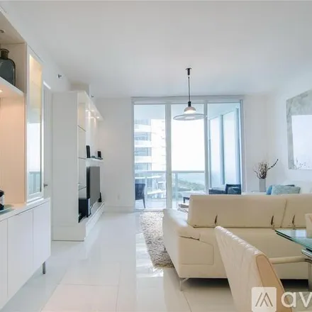 Rent this 3 bed apartment on 15811 Collins Ave