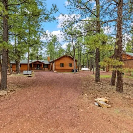 Buy this 3 bed house on 676 Friar Tuck Trail in Coconino County, AZ 86046