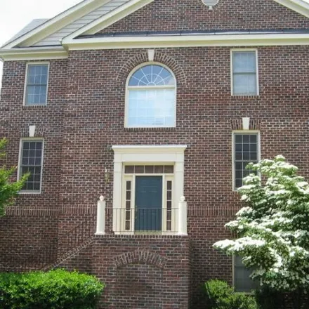 Rent this 4 bed townhouse on 1310 Wild Oak Terrace in Hungerford Towne, Rockville