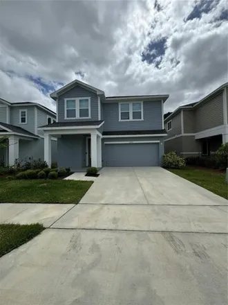 Rent this 3 bed house on Hibiscus Bloom Drive in Orange County, FL 32822